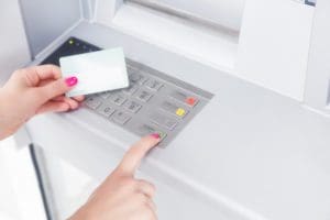 Woman Using ATM