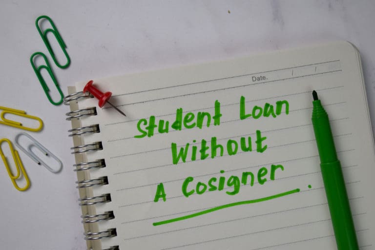 Student Loan Without A Cosigner Write On A Book Isolated Wooden Table