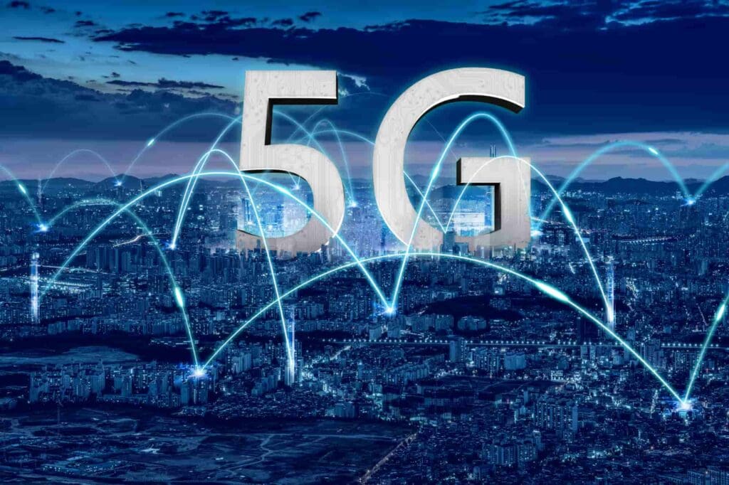 A city skyline illuminated by a glowing virtual 5G network, symbolizing advanced connectivity and smart infrastructure.